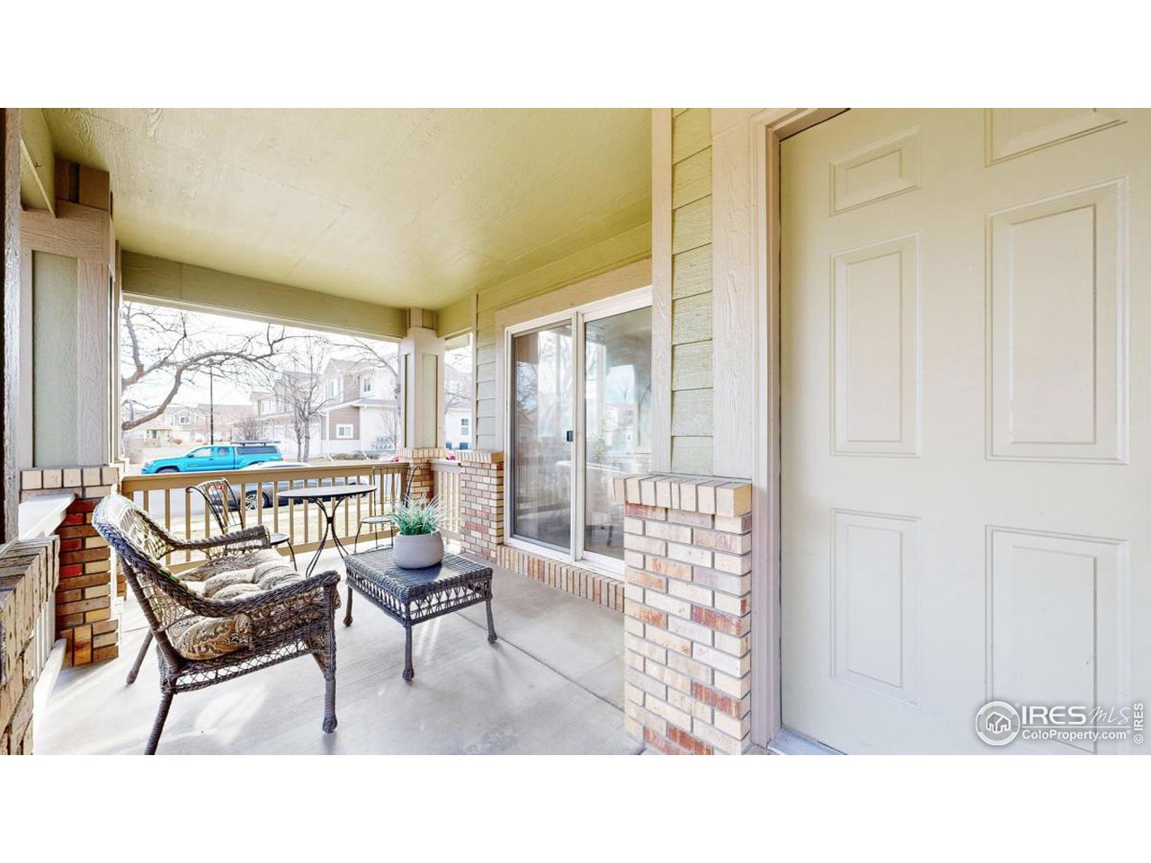 2621 Rigden Parkway, Unit 4 Fort Collins, CO 80525 - Photo 4 of 28 a balcony with chairs and outdoor view