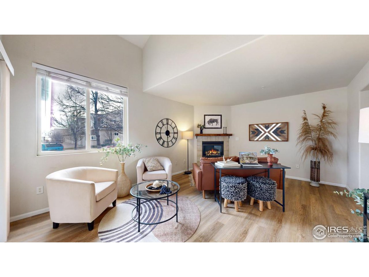 2621 Rigden Parkway, Unit 4 Fort Collins, CO 80525 - Photo 5 of 28 a living room with furniture and a window