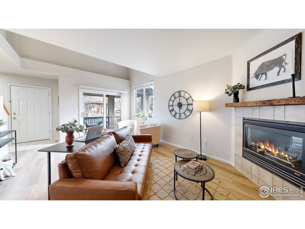 2621 Rigden Parkway, Unit 4 Fort Collins, CO 80525 - Photo 6 of 28 a living room with furniture and a fireplace