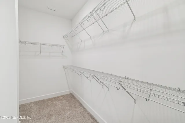 a view of a room with racks on the wall