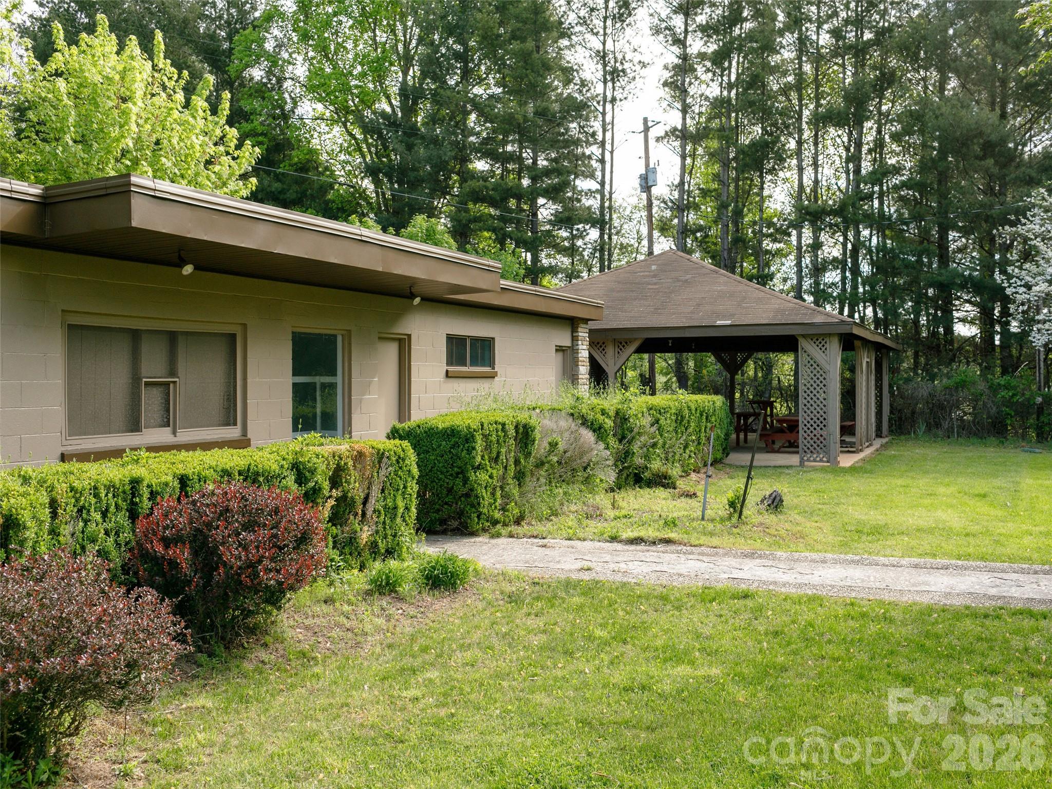 110 Crest View Road Burnsville, NC 28714 - Photo 33 of 45 a front view of a house with a yard