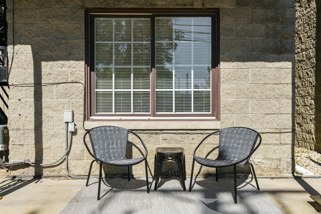 2349 West Harrison Street, Unit 1 Chicago, IL 60612 - Photo 21 of 25 a view of a chair and table in the balcony