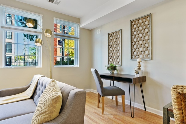 2349 West Harrison Street, Unit 1 Chicago, IL 60612 - Photo 6 of 25 a bedroom with furniture and a window