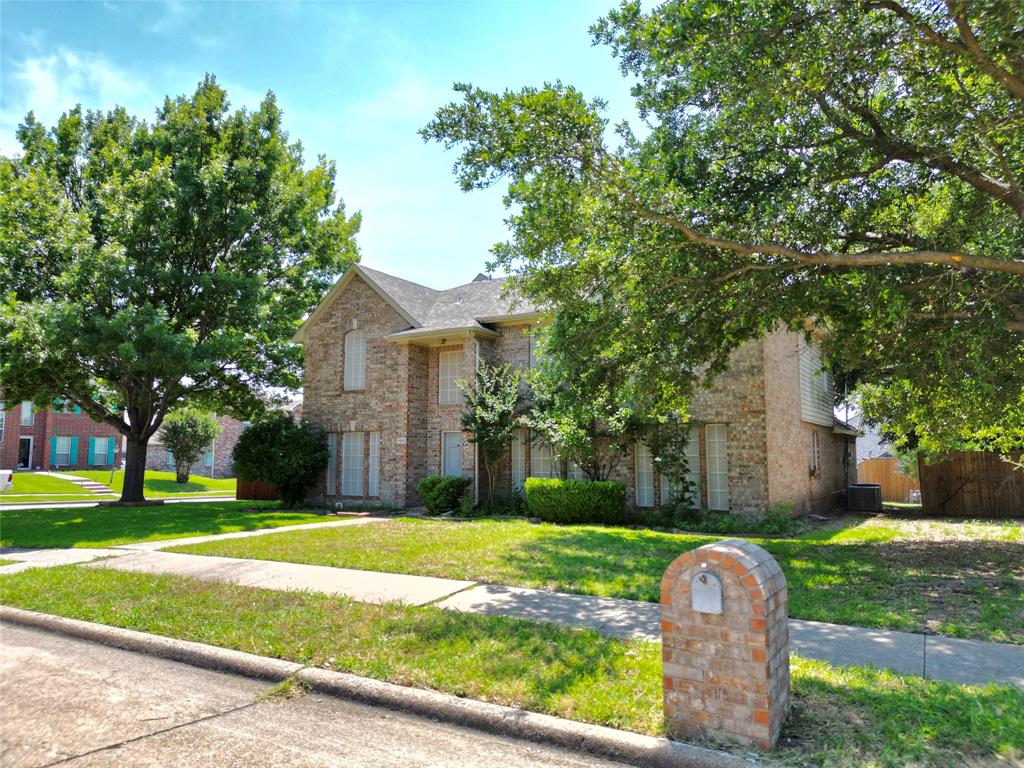 6301 Waterview Drive Rowlett, TX 75089 - Photo 1 of 1 a house view with a garden space