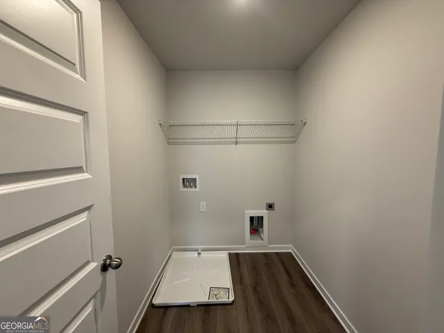 a view of small space with racks on the wall