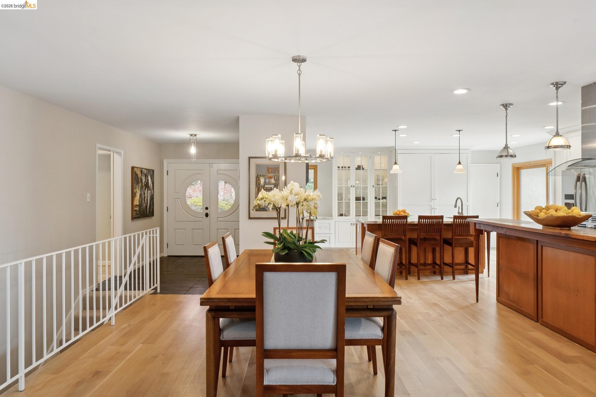 15 Christopher Court El Sobrante, CA 94803 - Photo 36 of 99 a view of a dining room and livingroom with furniture wooden floor a chandelier