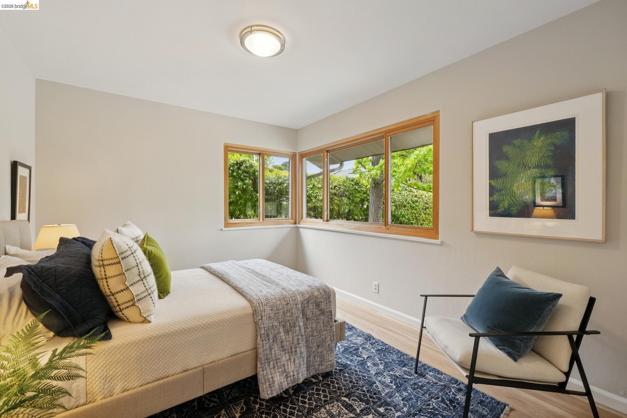 15 Christopher Court El Sobrante, CA 94803 - Photo 46 of 99 a bedroom with a bed and chair