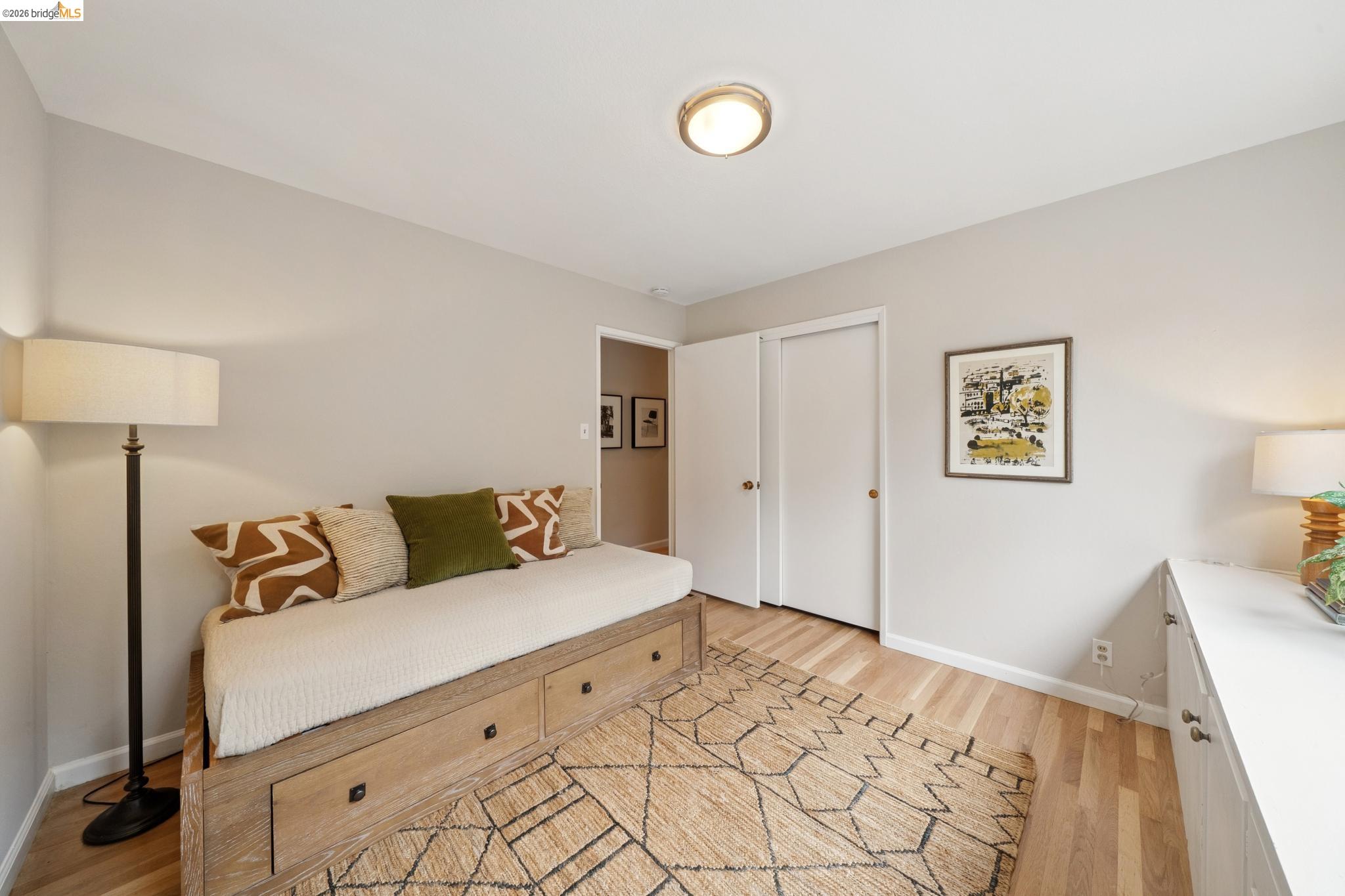 15 Christopher Court El Sobrante, CA 94803 - Photo 50 of 99 a bedroom with a bed and a lamp