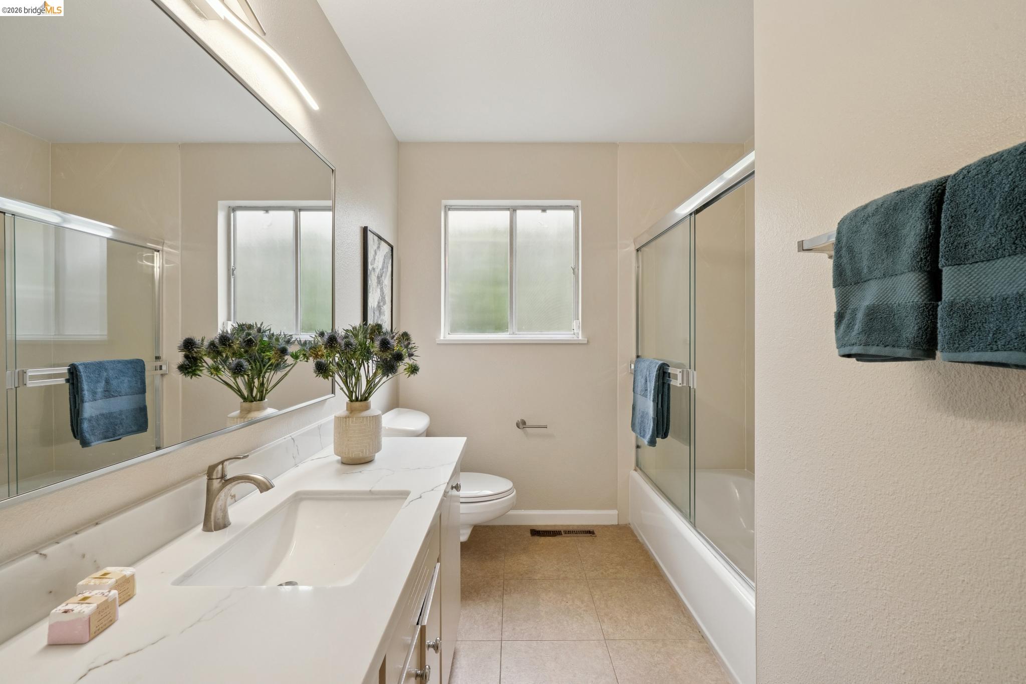 15 Christopher Court El Sobrante, CA 94803 - Photo 52 of 99 a bathroom with a sink a toilet and shower