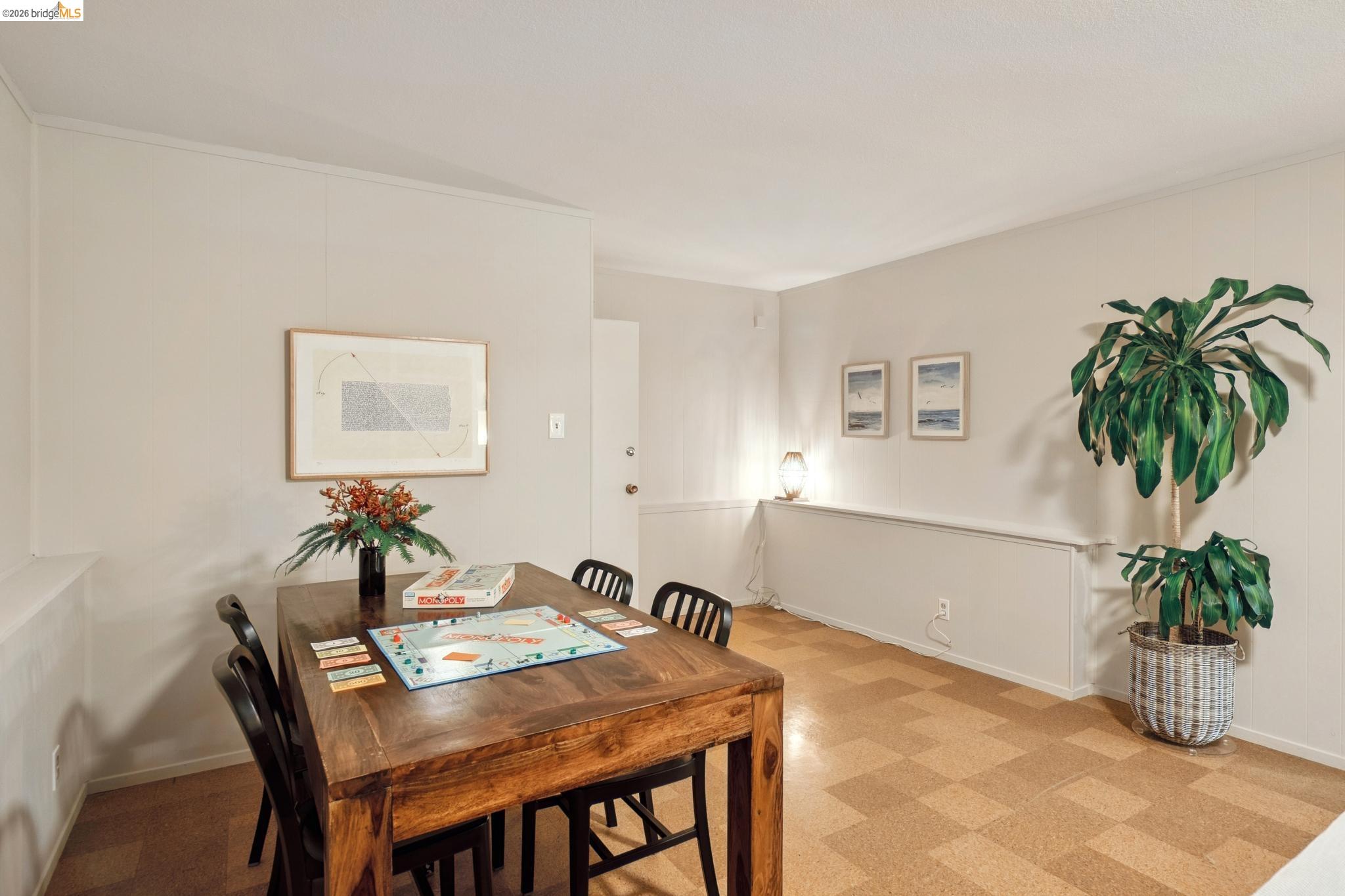 15 Christopher Court El Sobrante, CA 94803 - Photo 72 of 99 a dining room with furniture and a potted plant