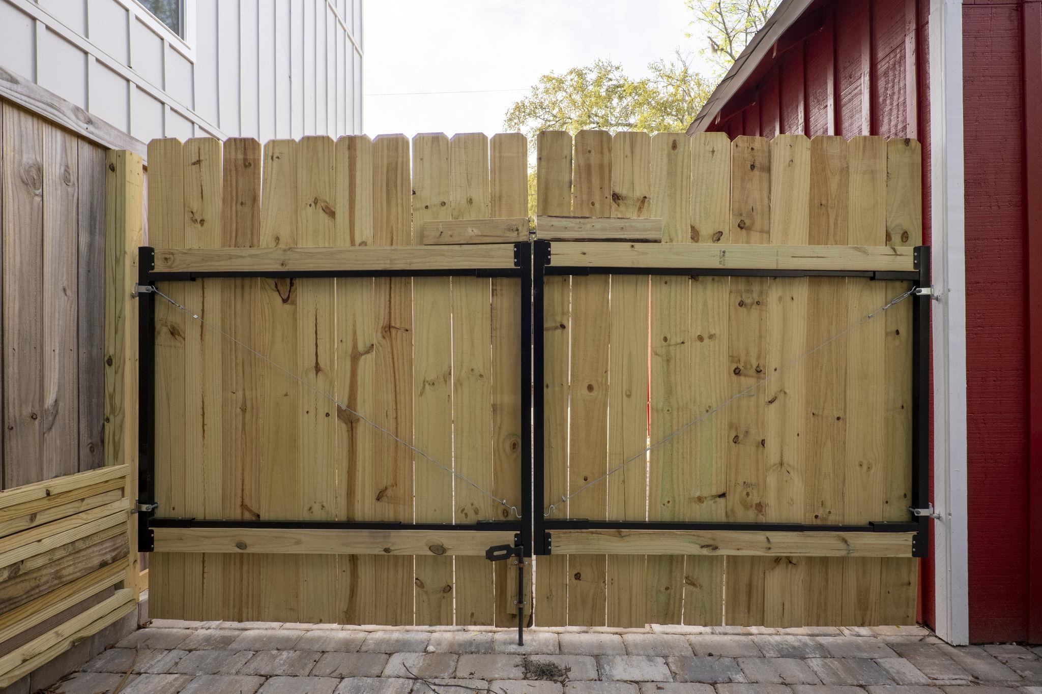 112 Moore Street St. Augustine, FL 32084 - Photo 27 of 35 a view of a utility room with wooden fence
