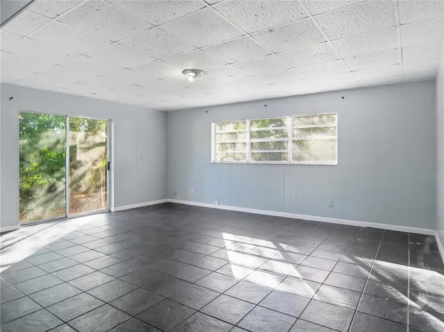 an empty room with windows