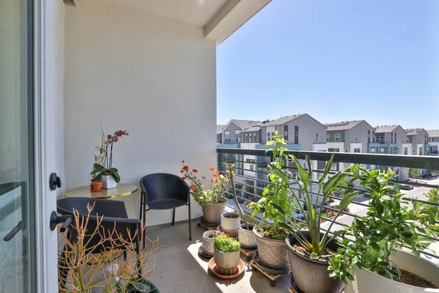 a view of a terrace with seating space