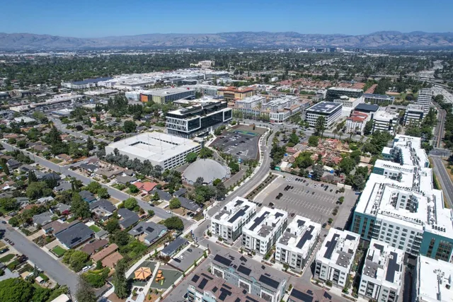a view of a city with mountain