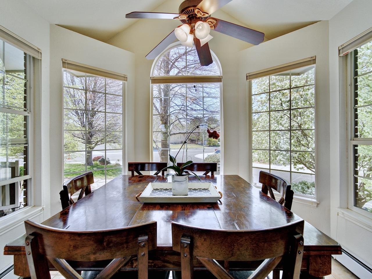2332 North Falcon Point Court Grand Junction, CO 81507 - Photo 13 of 39 a view of a dining room with furniture window and wooden floor