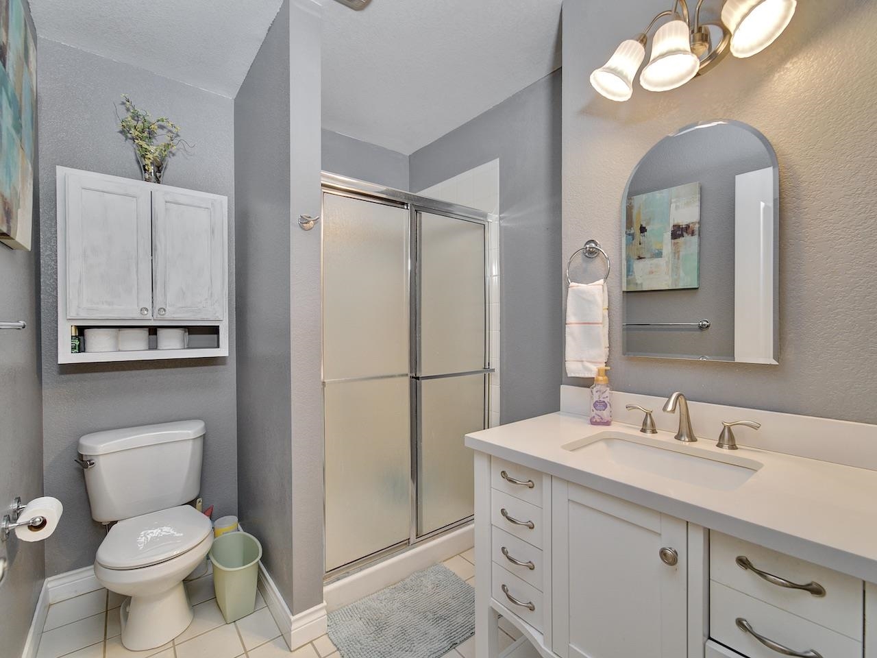 2332 North Falcon Point Court Grand Junction, CO 81507 - Photo 25 of 39 a bathroom with a toilet sink and mirror