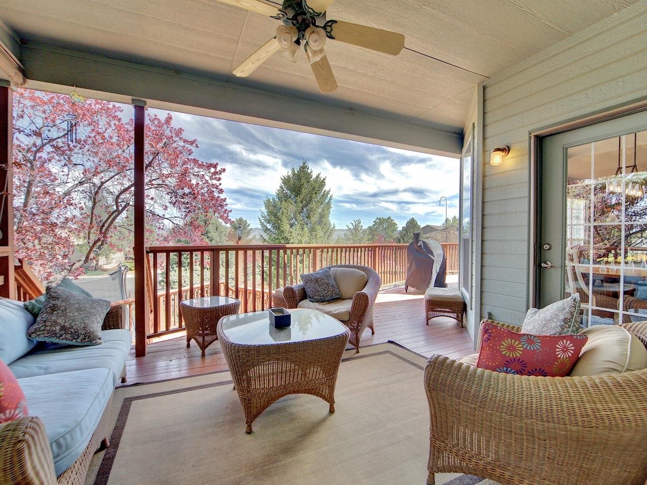 2332 North Falcon Point Court Grand Junction, CO 81507 - Photo 27 of 39 a outdoor living space with furniture and a potted plant