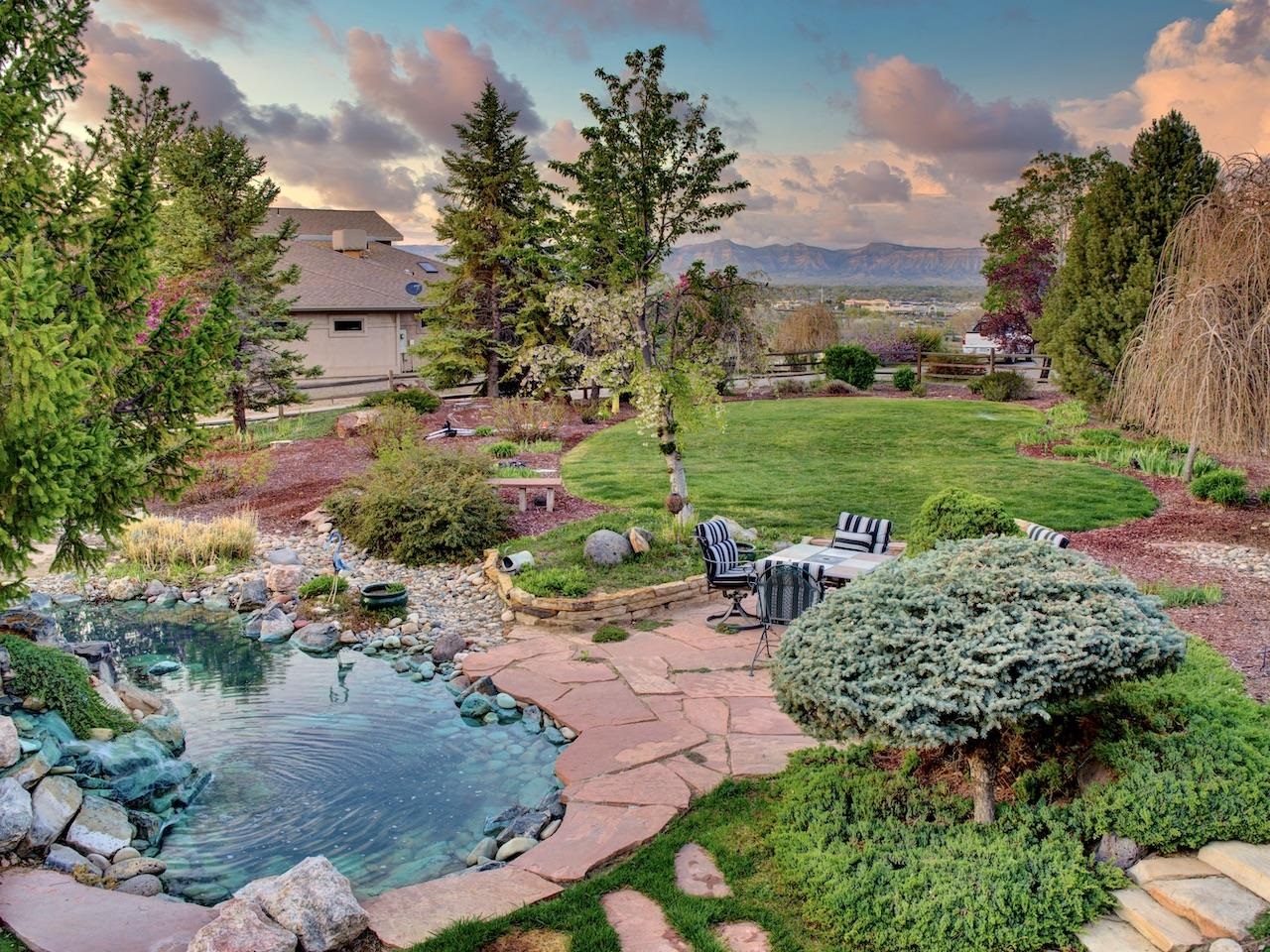 2332 North Falcon Point Court Grand Junction, CO 81507 - Photo 29 of 39 a view of outdoor space yard and green space