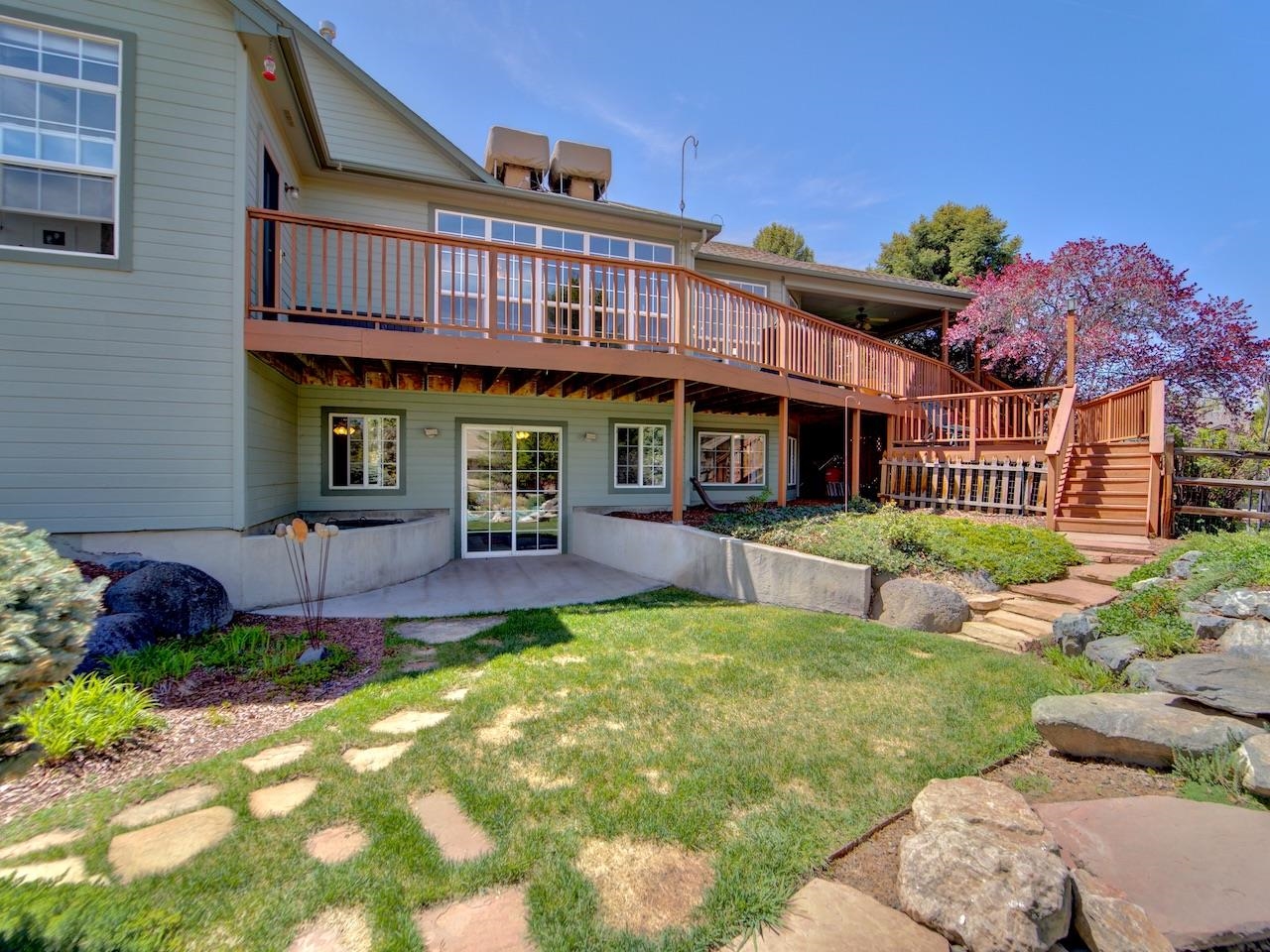 2332 North Falcon Point Court Grand Junction, CO 81507 - Photo 31 of 39 a view of a house with a yard porch and sitting area