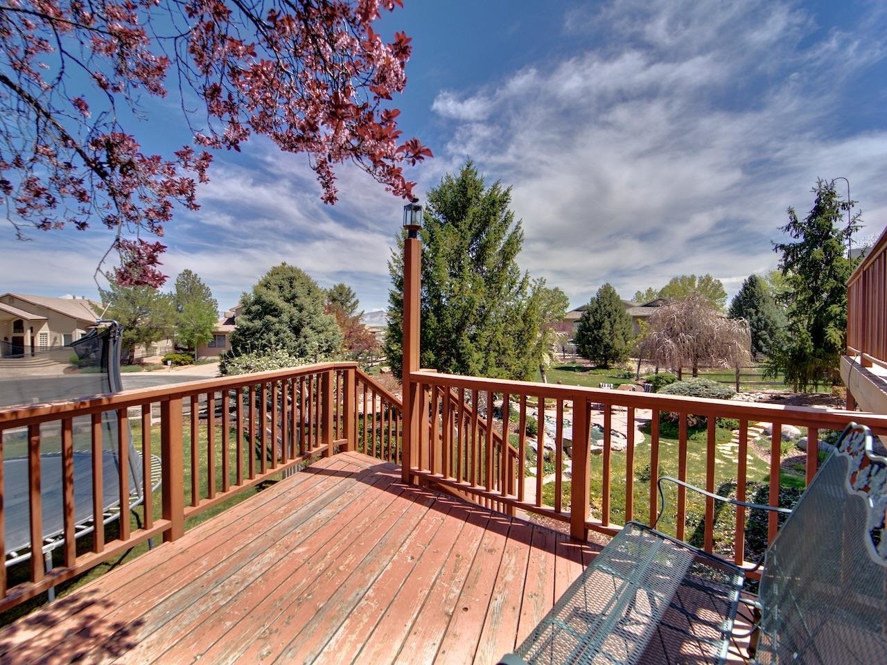 2332 North Falcon Point Court Grand Junction, CO 81507 - Photo 34 of 39 a view of balcony with wooden floor and fence