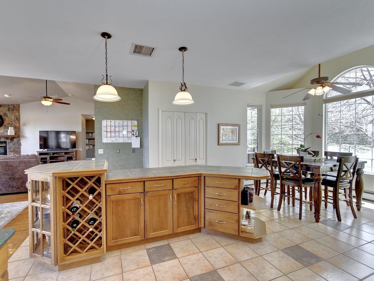 2332 North Falcon Point Court Grand Junction, CO 81507 - Photo 10 of 39 a large kitchen with a table and chairs