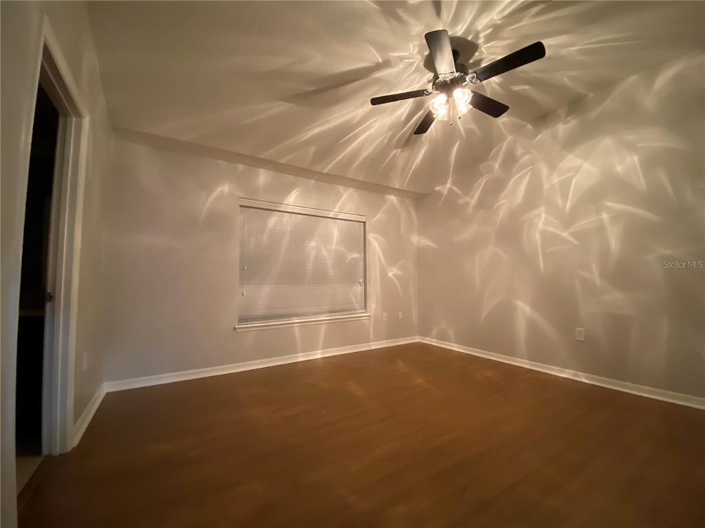 6460 South Goldenrod Road, Unit 30B Orlando, FL 32822 - Photo 13 of 20 a view of an empty room