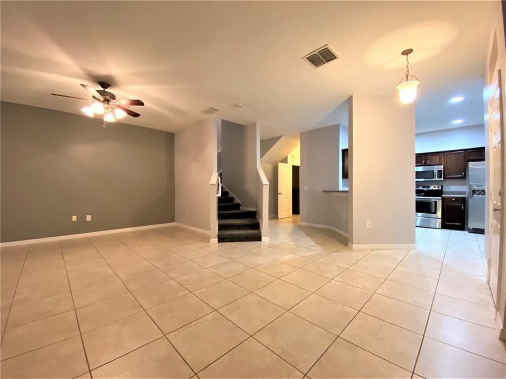 6460 South Goldenrod Road, Unit 30B Orlando, FL 32822 - Photo 2 of 20 a view of an empty room with a window