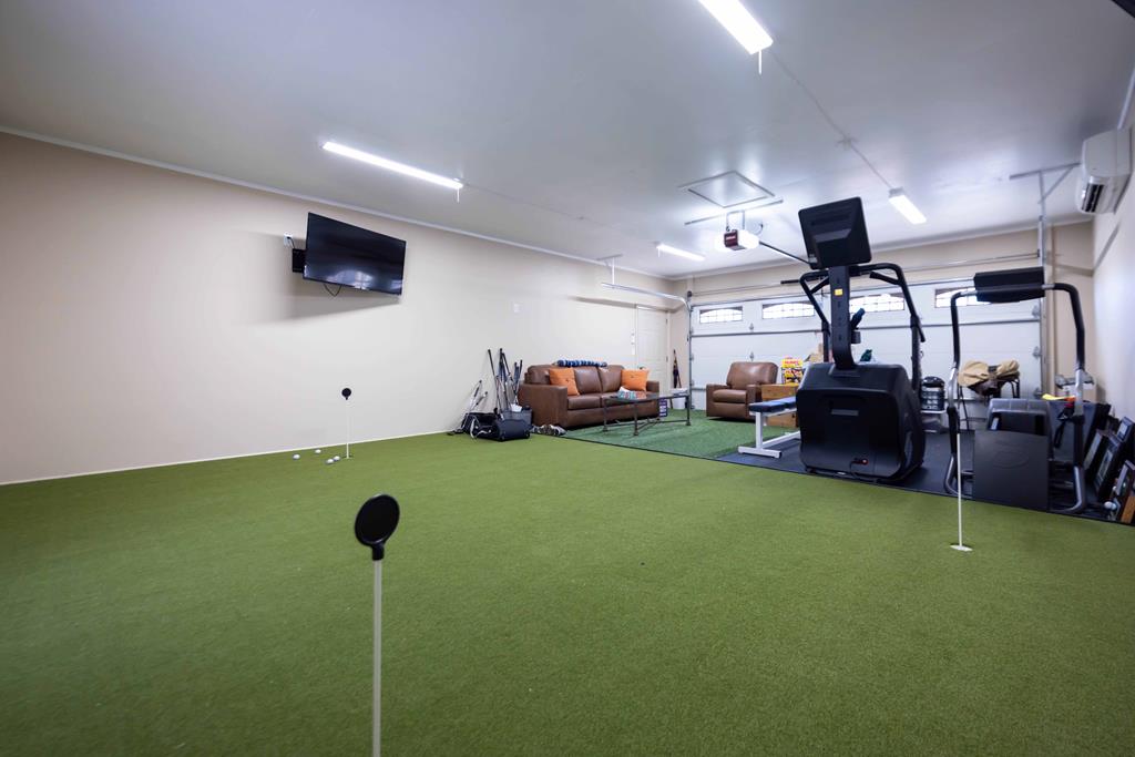 5 Odom Drive Hamilton, GA 31811 - Photo 76 of 89 a living room with furniture and a flat screen tv