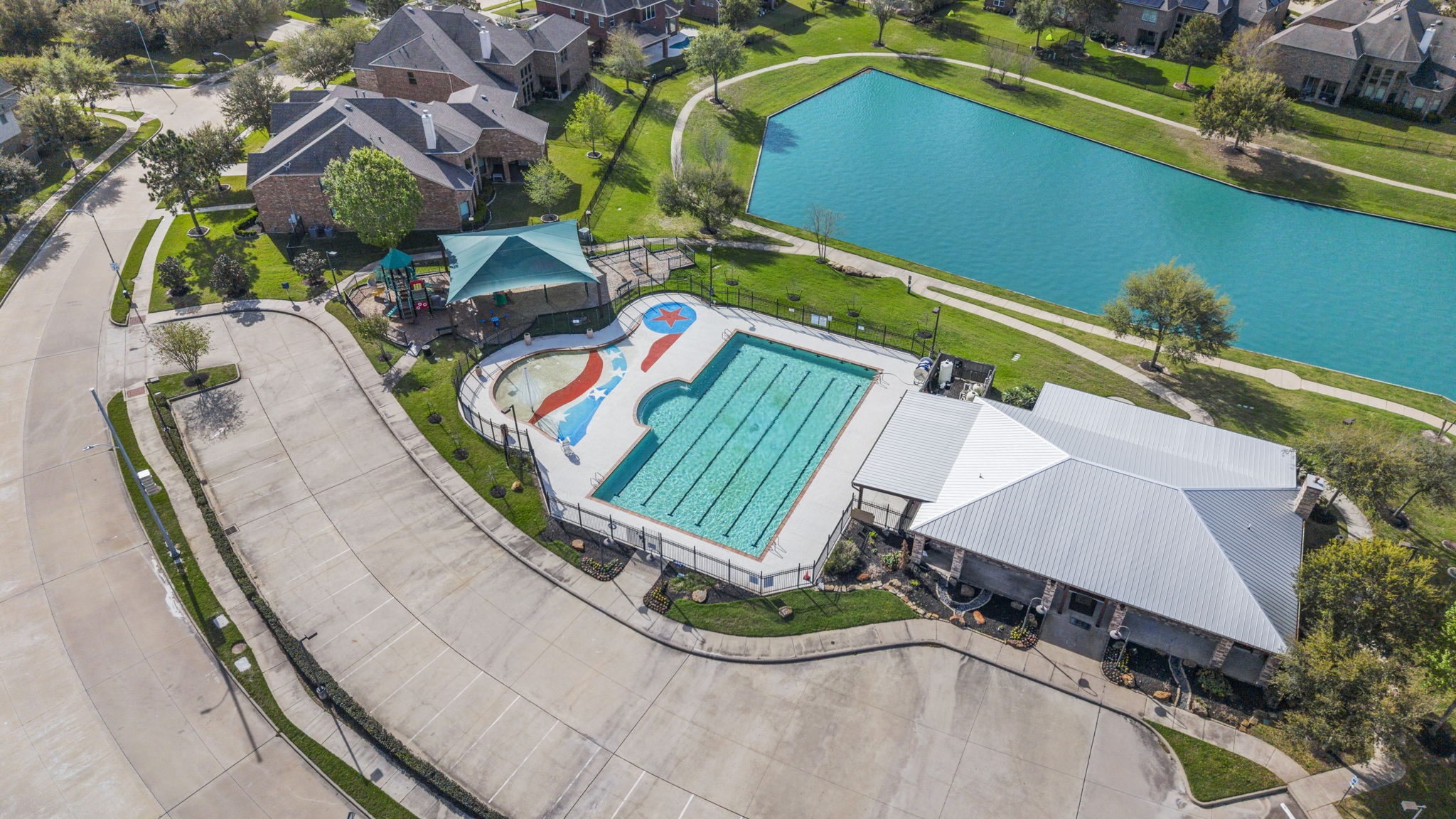 3426 Summer Ranch Drive Katy, TX 77494 - Photo 47 of 48 Enjoy access to resort-style amenities including a community pool and gathering spaces, perfect for spending time with family and friends.
