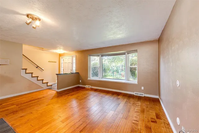 a view of an empty room and window