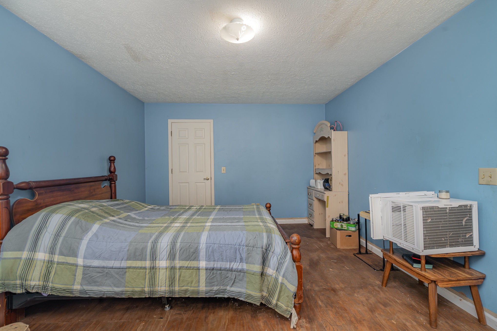 79 Goshen Road Lebanon, TN 37087 - Photo 11 of 27 a bedroom with a bed and a chair