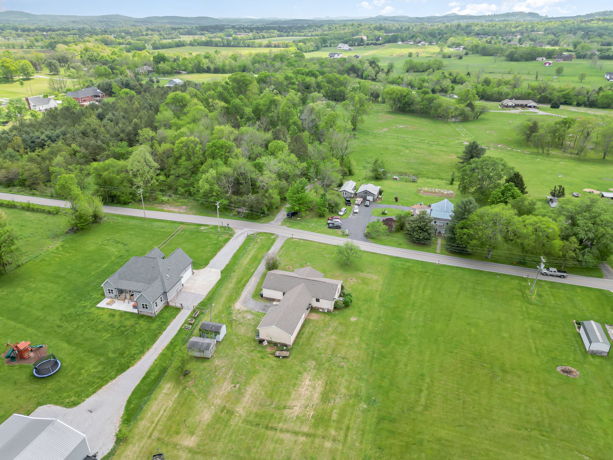 79 Goshen Road Lebanon, TN 37087 - Photo 25 of 27 a view of a golf course with a lake