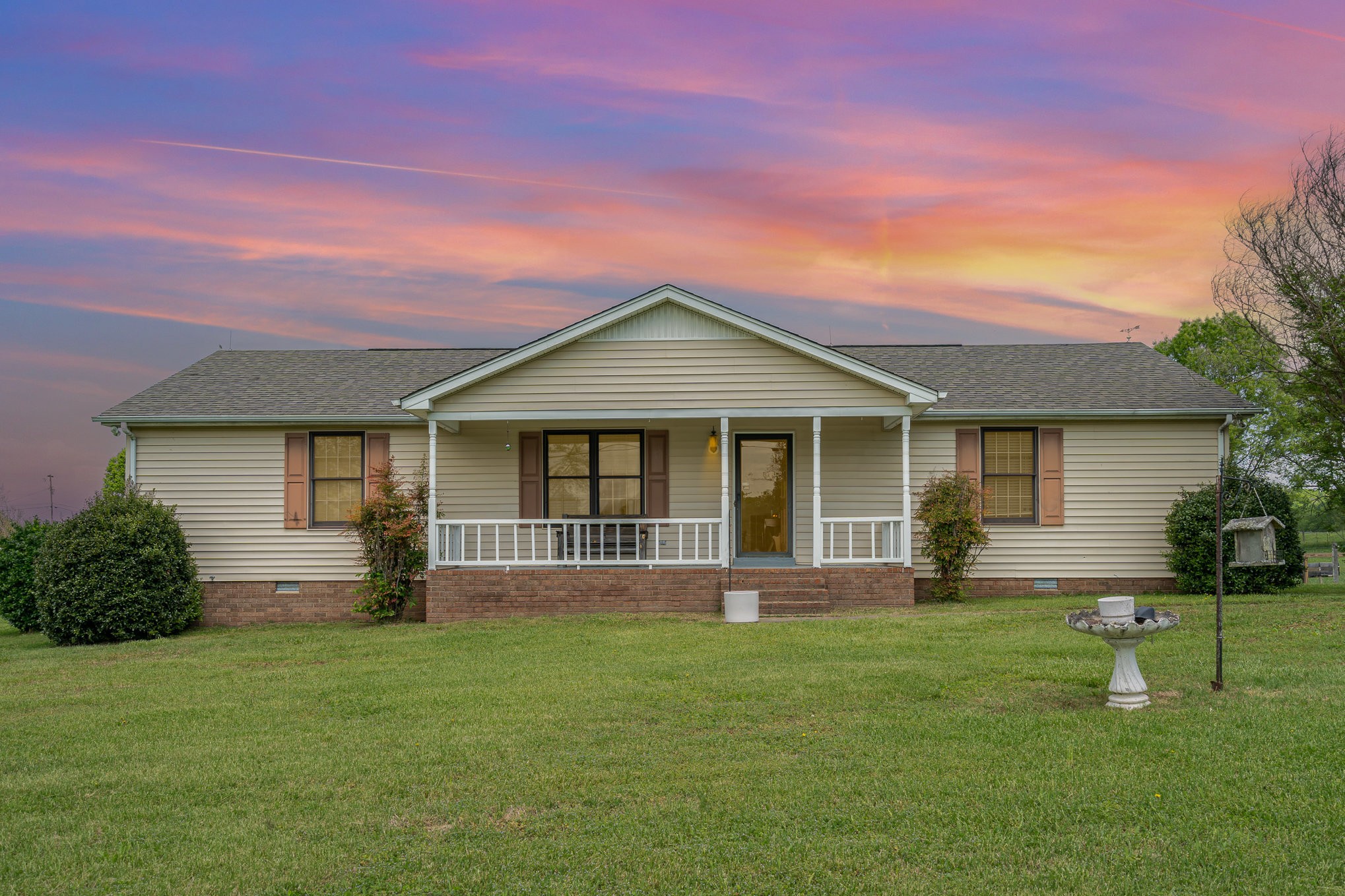 79 Goshen Road Lebanon, TN 37087 - Photo 27 of 27 a front view of a house with a yard and green space