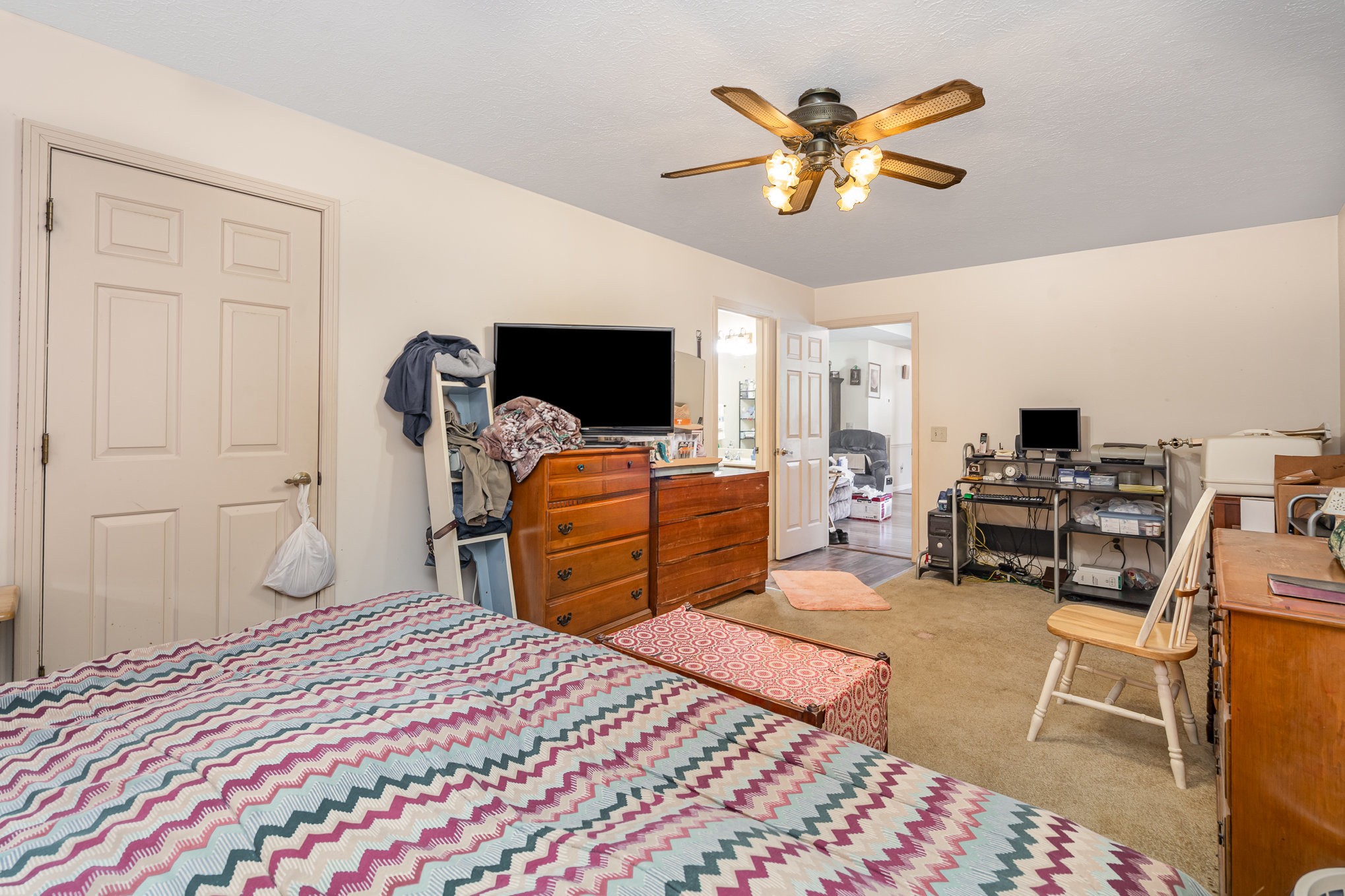 79 Goshen Road Lebanon, TN 37087 - Photo 9 of 27 a bedroom with a bed and a flat screen tv