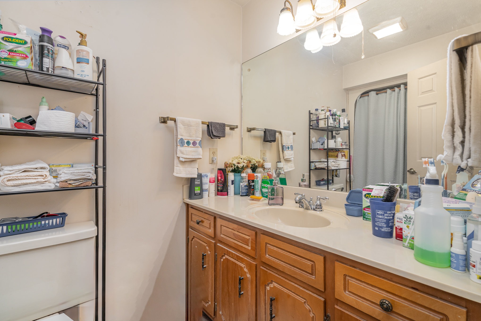 79 Goshen Road Lebanon, TN 37087 - Photo 10 of 27 a bathroom with a sink a vanity and a mirror