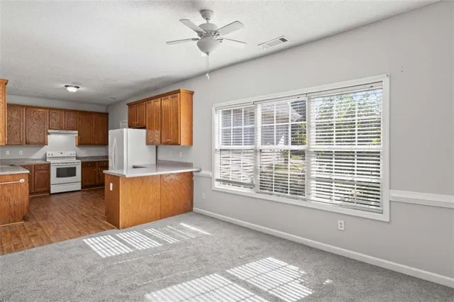 a large kitchen with cabinets