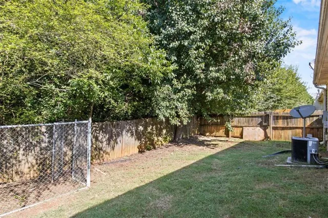 a view of a yard with a slide