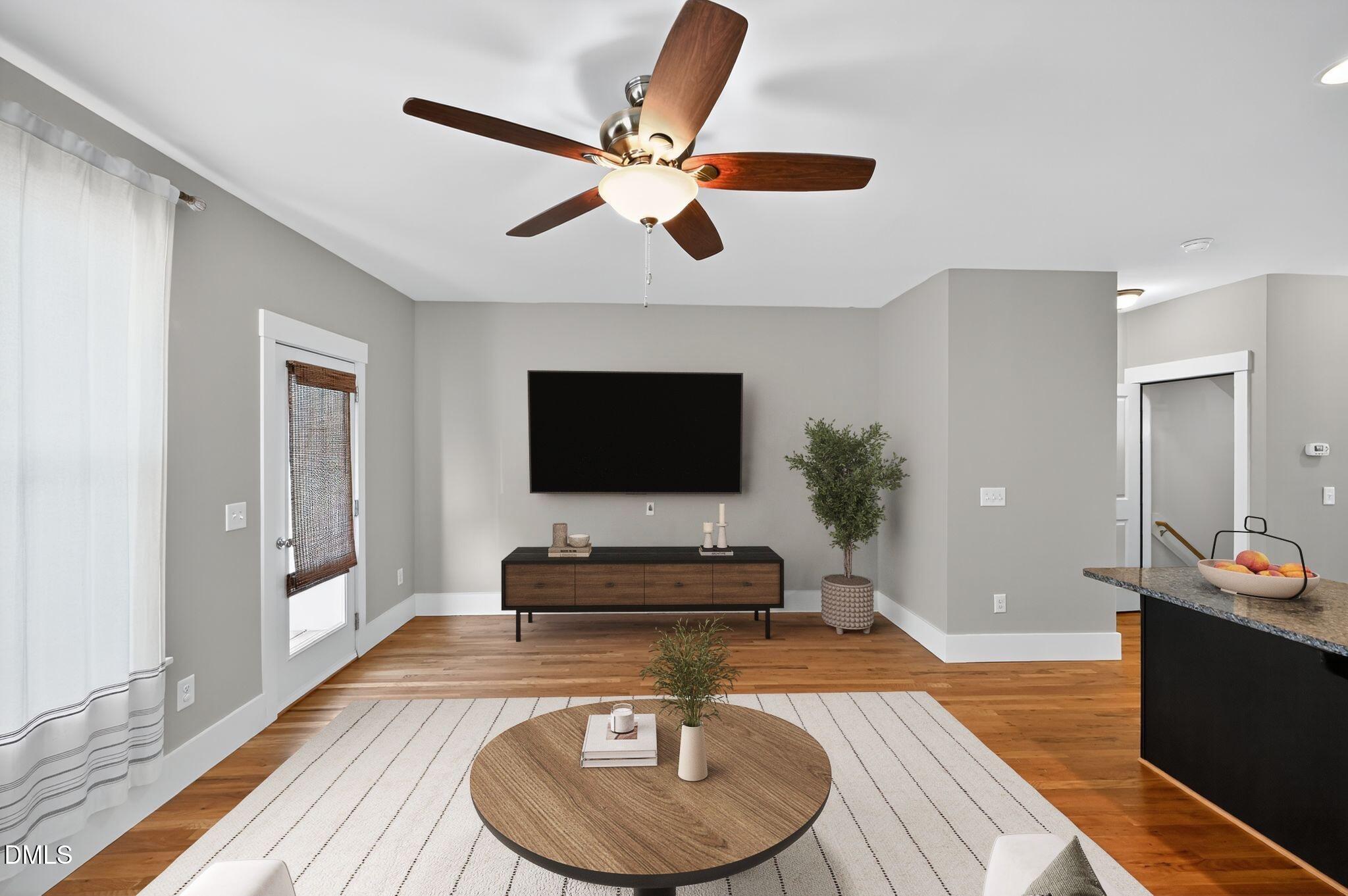 44 Owen Towne Road Chapel Hill, NC 27516 - Photo 6 of 64 a living room with furniture and a flat screen tv