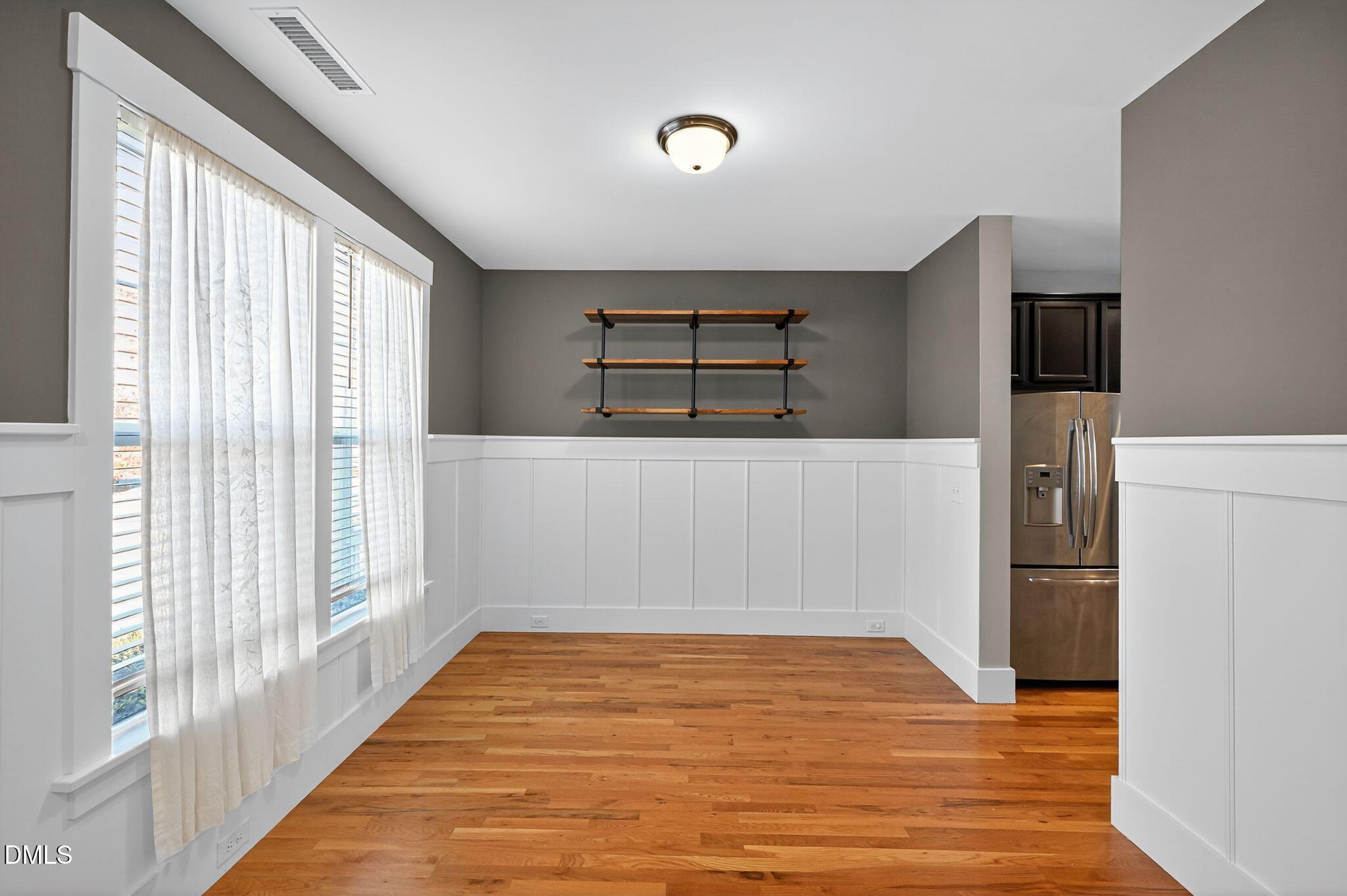44 Owen Towne Road Chapel Hill, NC 27516 - Photo 13 of 64 a view of empty room with wooden floor and window