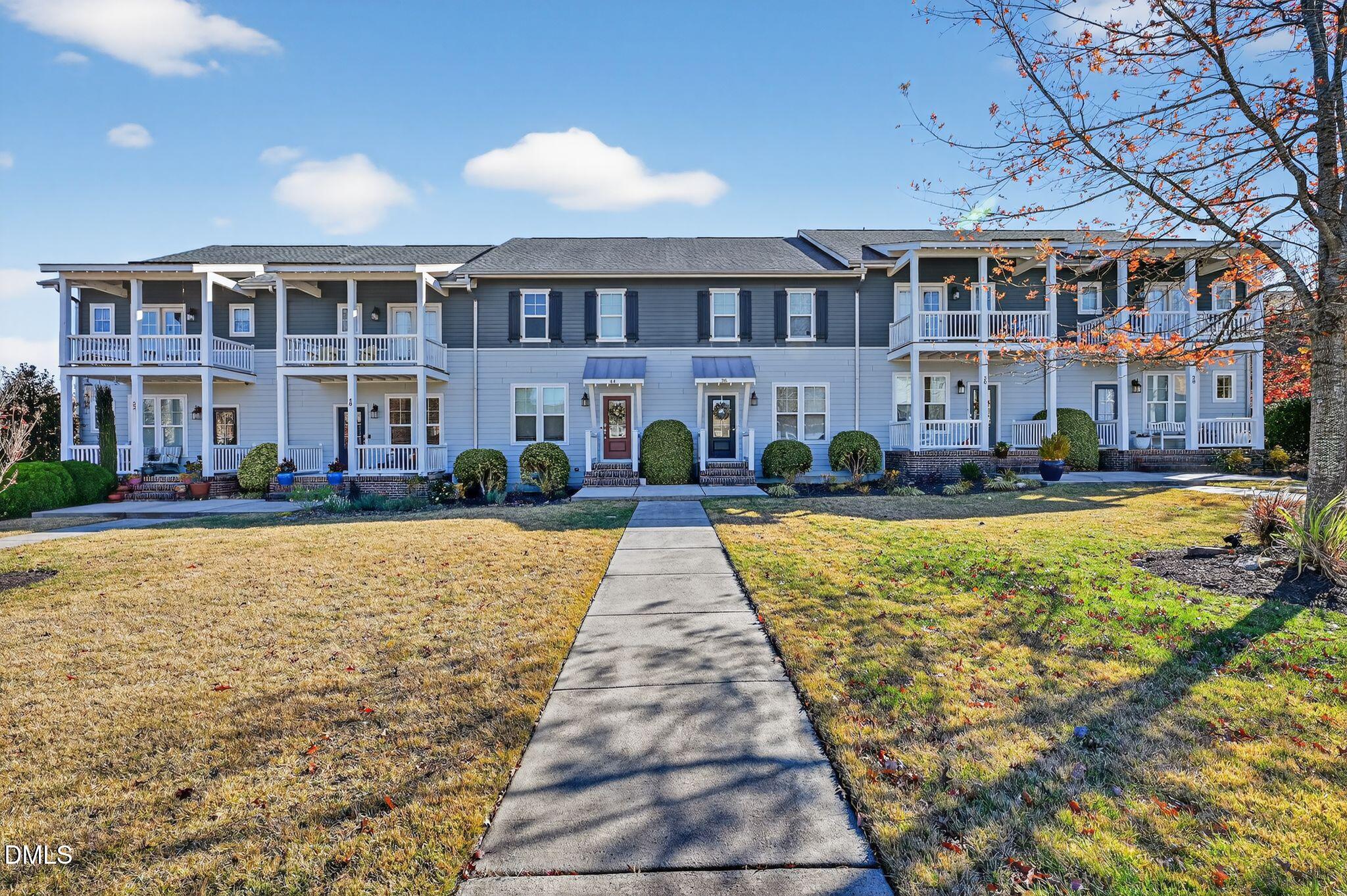 44 Owen Towne Road Chapel Hill, NC 27516 - Photo 2 of 64 a front view of residential houses with yard
