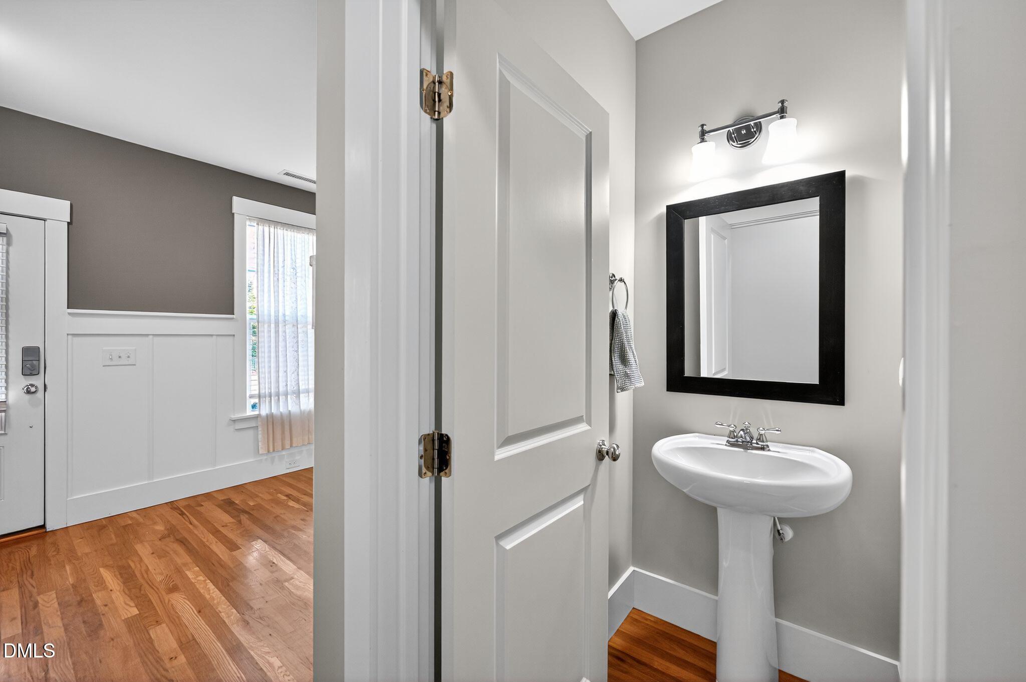 44 Owen Towne Road Chapel Hill, NC 27516 - Photo 19 of 64 a bathroom with a sink and a mirror