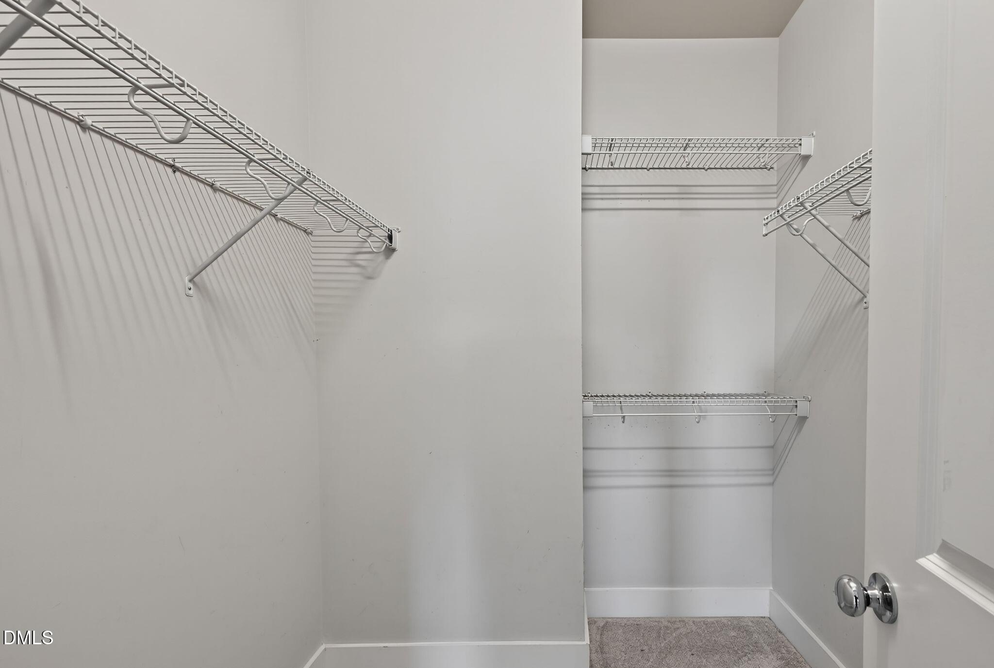 44 Owen Towne Road Chapel Hill, NC 27516 - Photo 31 of 64 a view of a room with racks on the wall