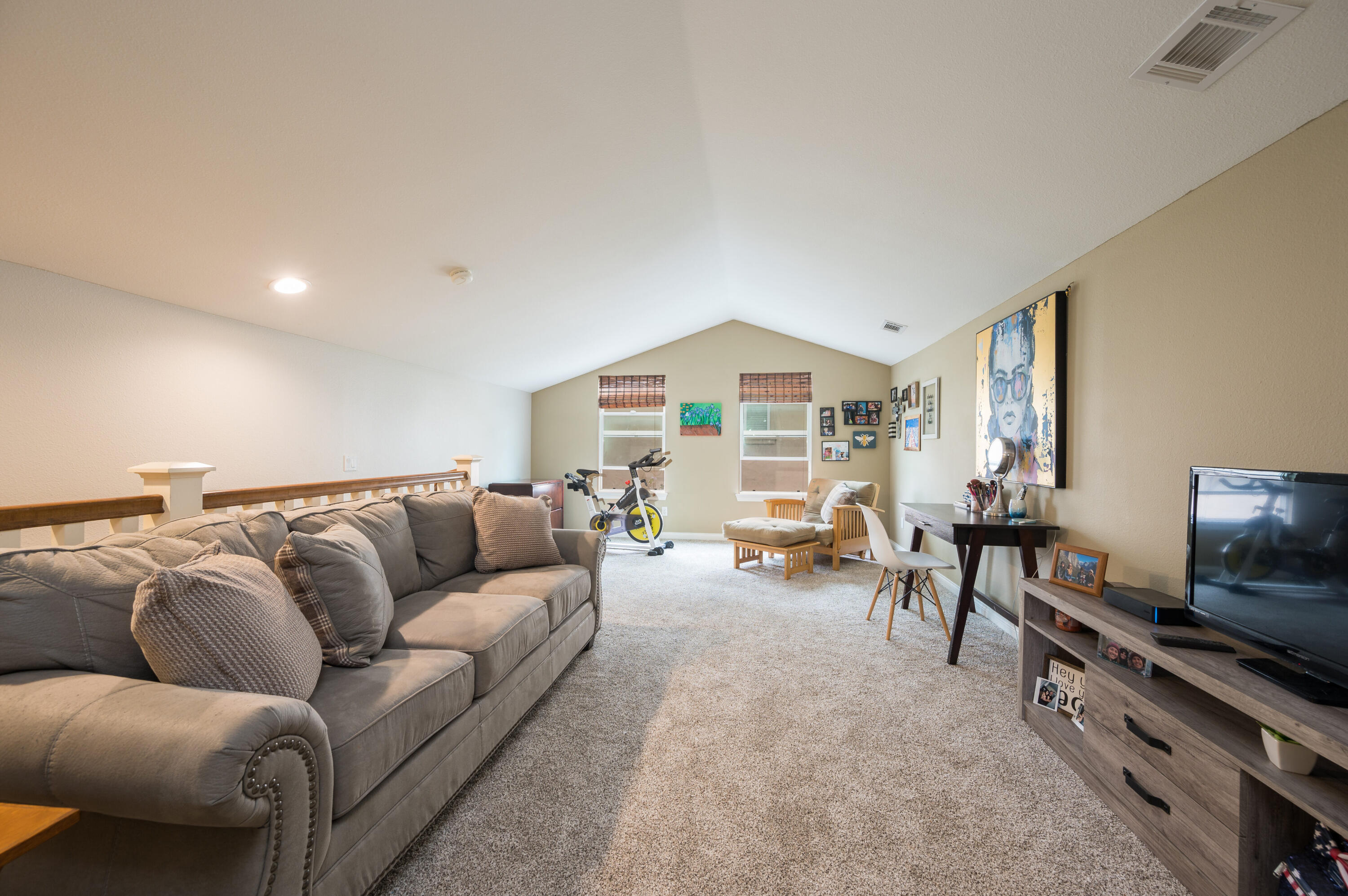 529 Palomar Circle Lompoc, CA 93436 - Photo 31 of 42 a living room with furniture a flat screen tv and a window