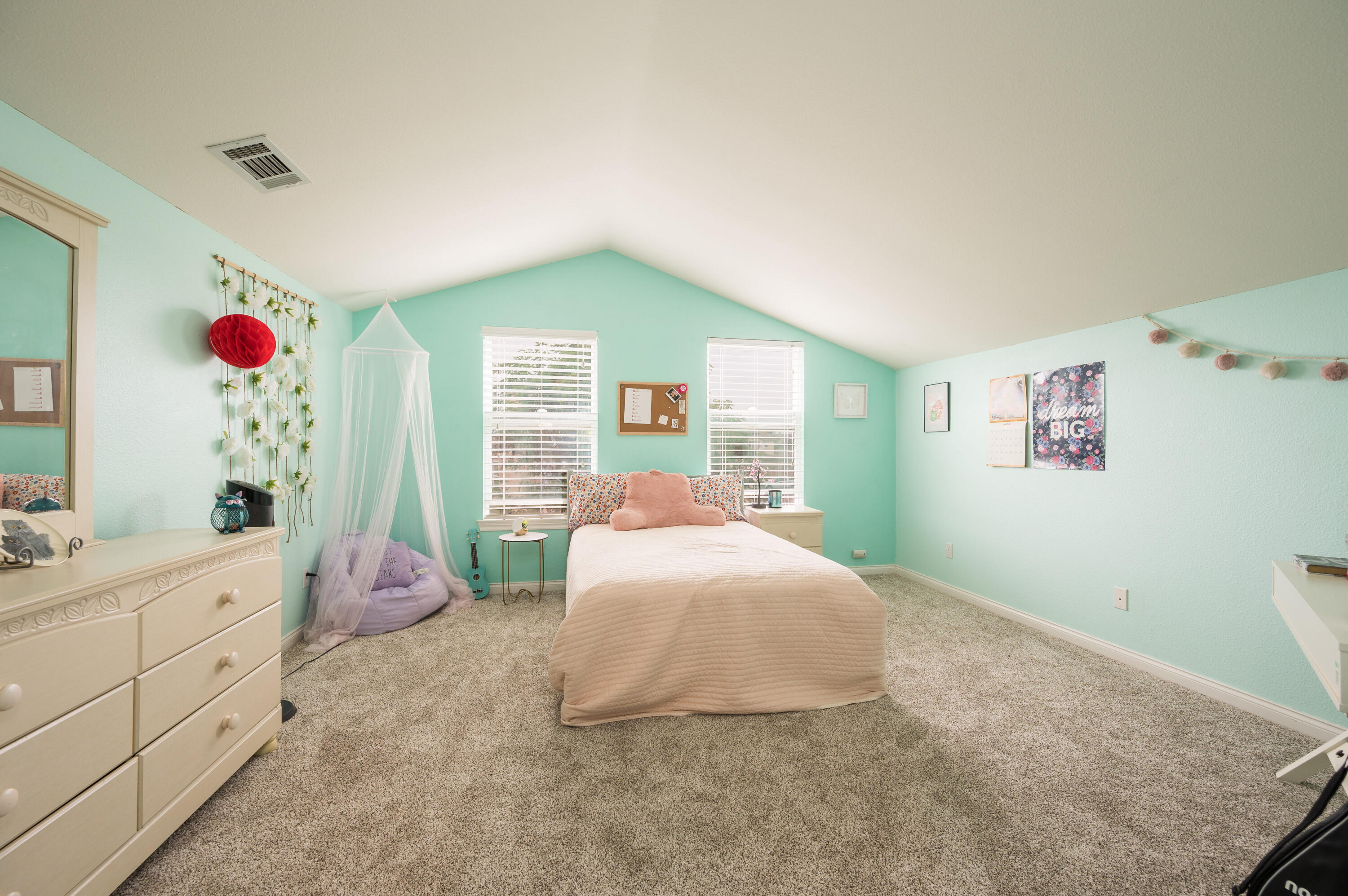 529 Palomar Circle Lompoc, CA 93436 - Photo 32 of 42 a spacious bedroom with a bed and a window