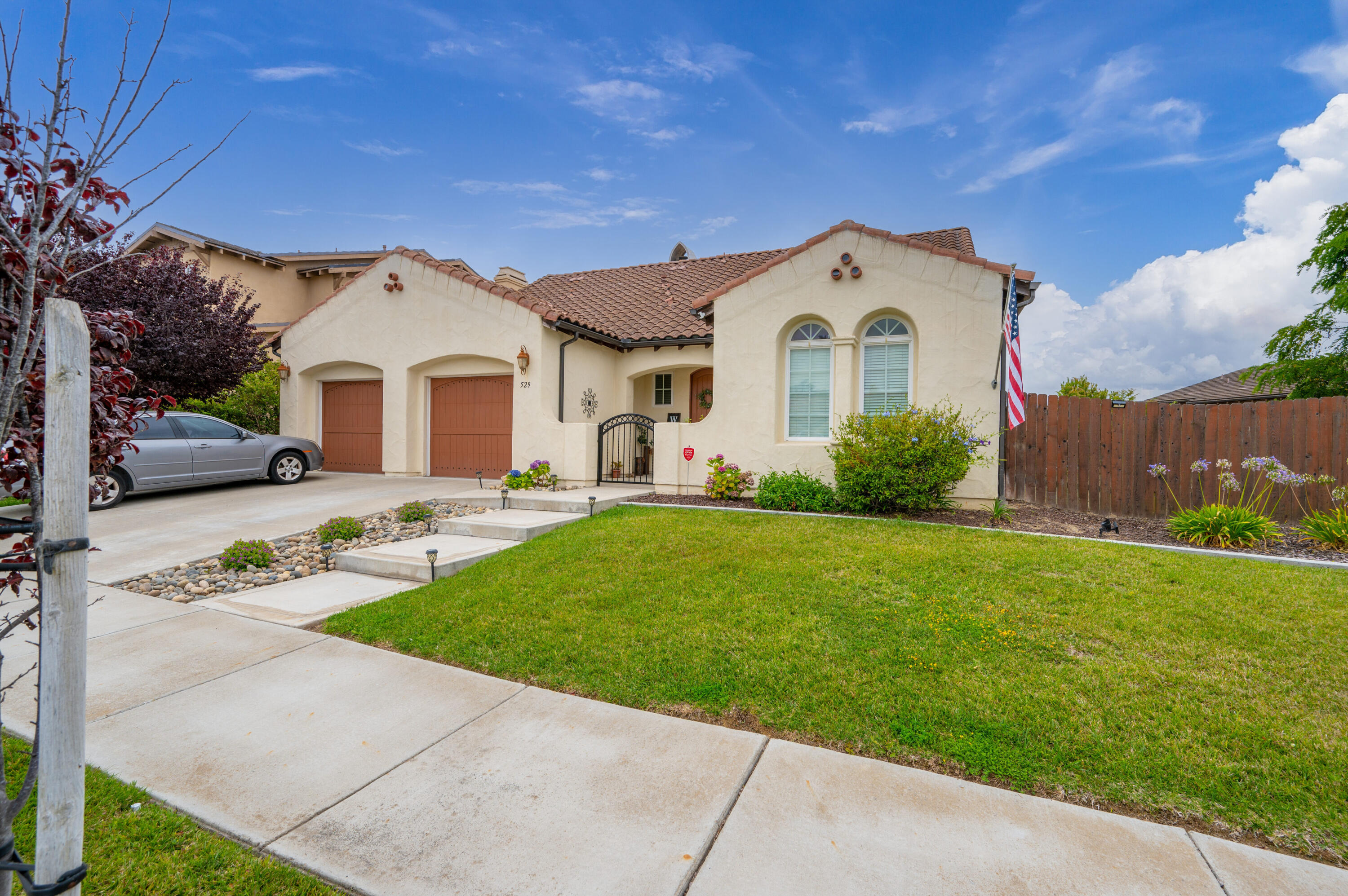 529 Palomar Circle Lompoc, CA 93436 - Photo 4 of 42 a front view of a house with garden