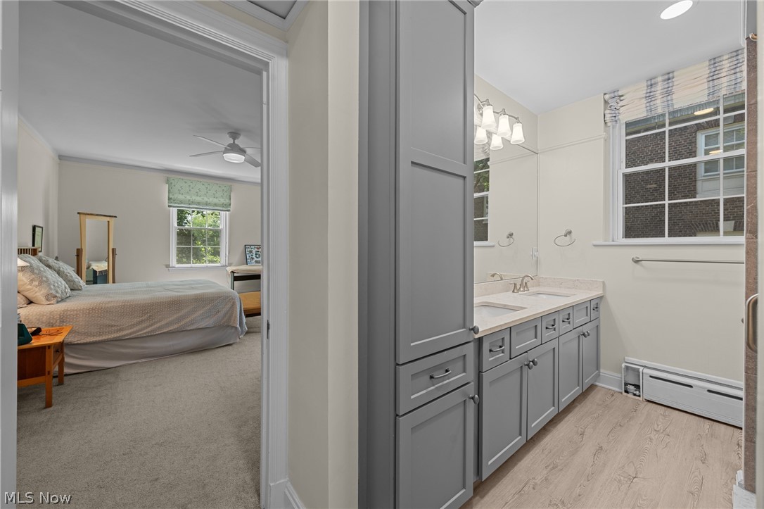 12546 Cedar Road, Unit 4 Cleveland Heights, OH 44106 - Photo 35 of 43 Updated Jack-n Jill full bathroom with double vanity, quartz countertop, and oversized shower