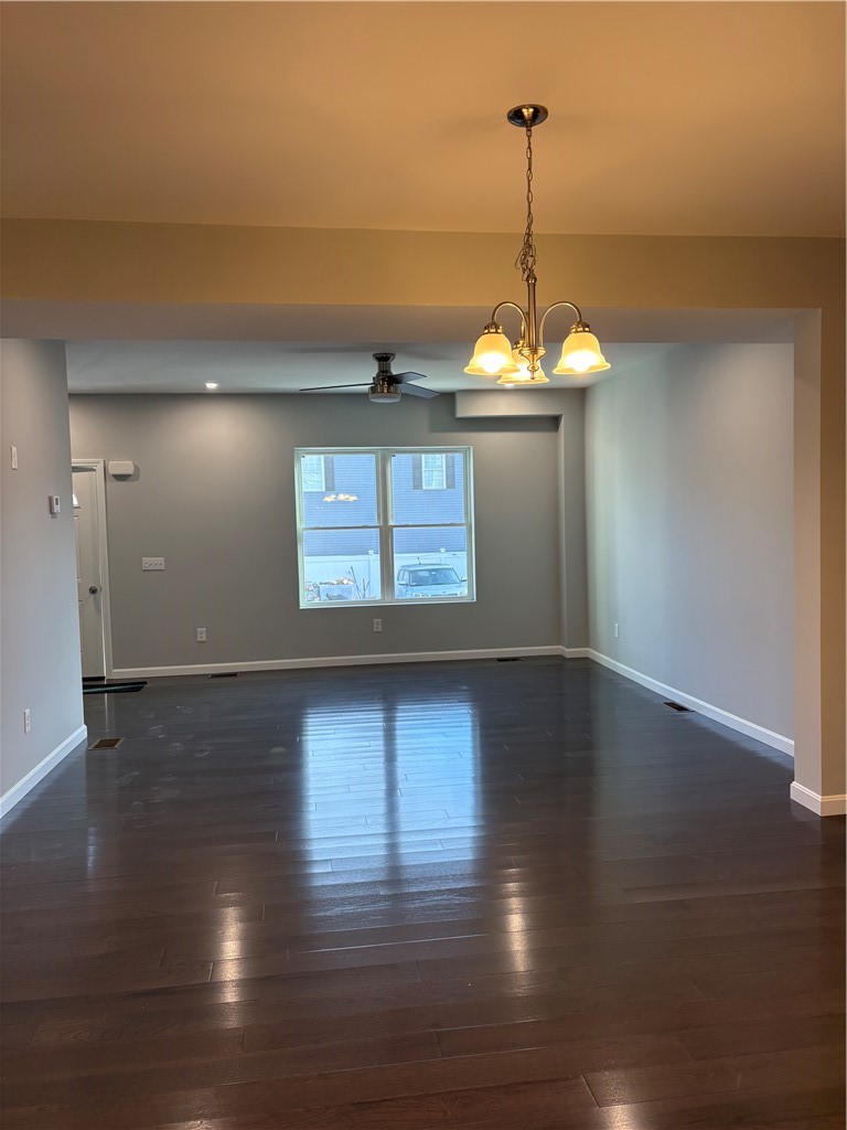 184 Avenue C, Unit M2 Woonsocket, RI 02895 - Photo 4 of 11 Spacious living and dining area with beautiful hardwood floors.