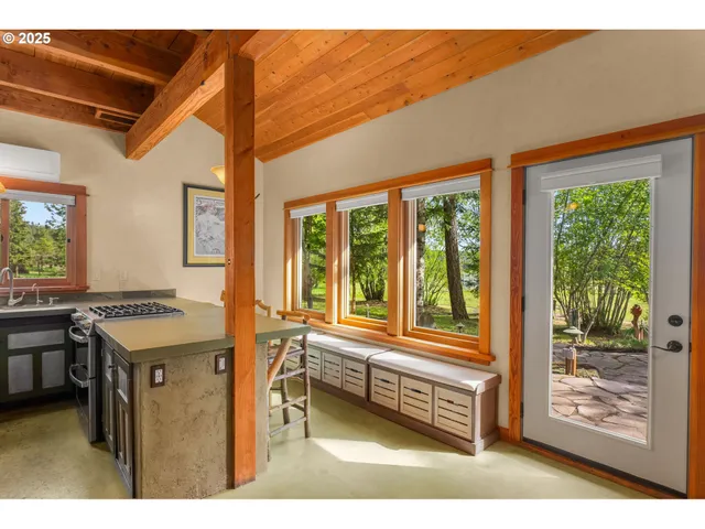 a kitchen with a stove and a refrigerator