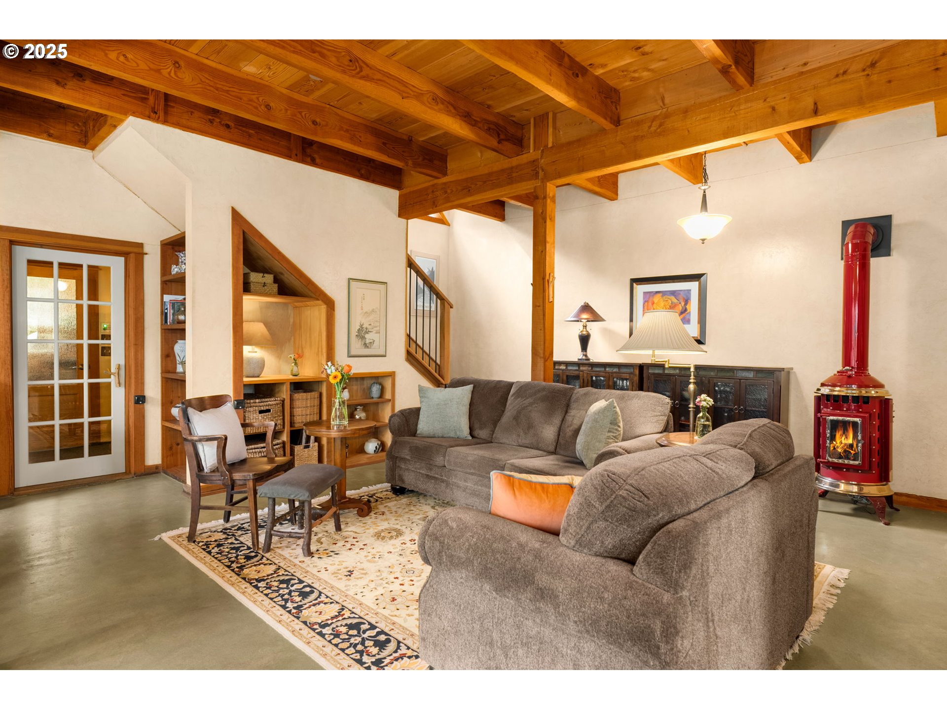 961 Snowden Road White Salmon, WA 98672 - Photo 14 of 48 a living room with furniture and a wooden floor