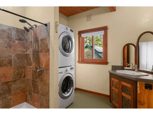 a utility room with dryer and washer